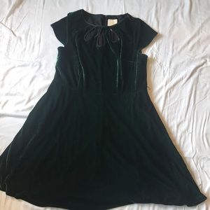 Green velvet dress with cutout neckline